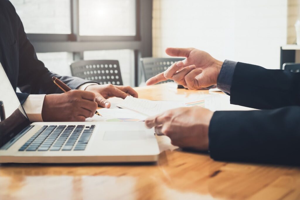 Business people discussing consequences