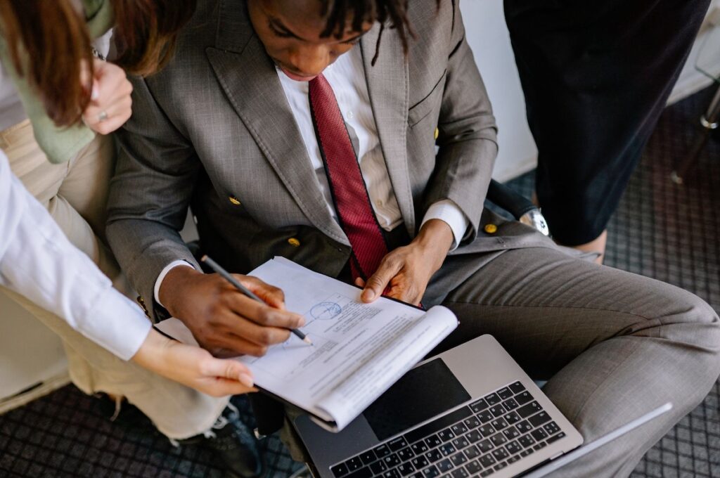 Business man and woman working with documents