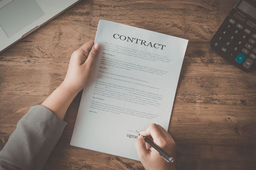 Contract being signed