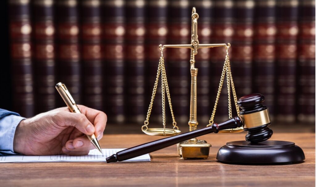 Judicial decision with scales and gavel