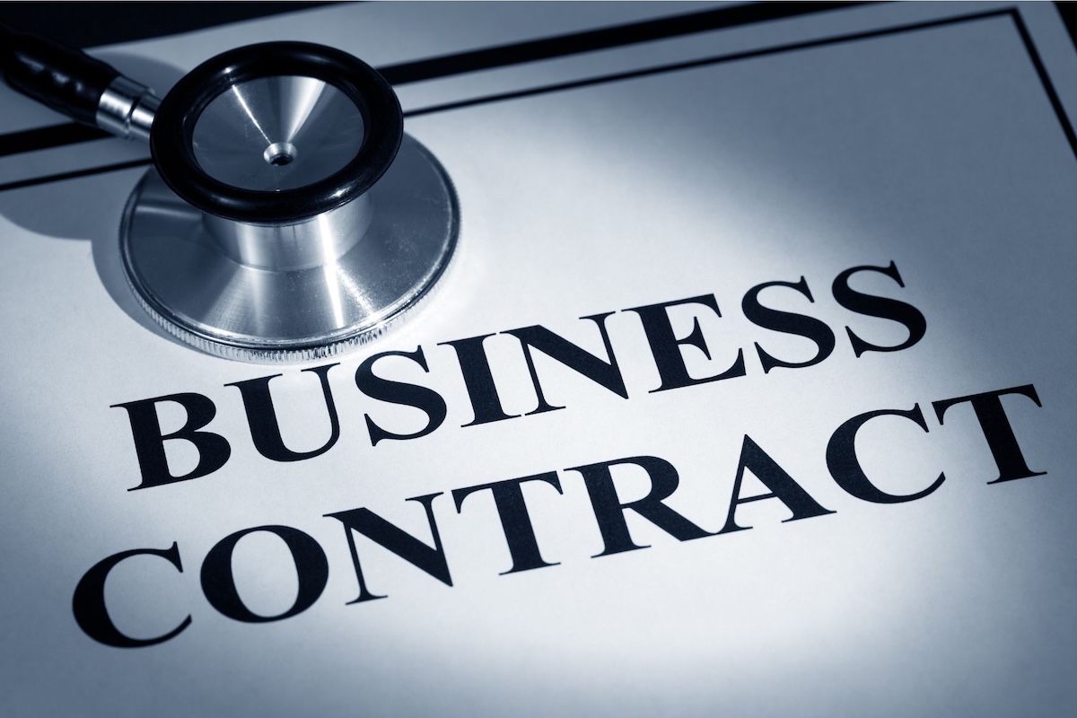 Stethoscope and a business contract