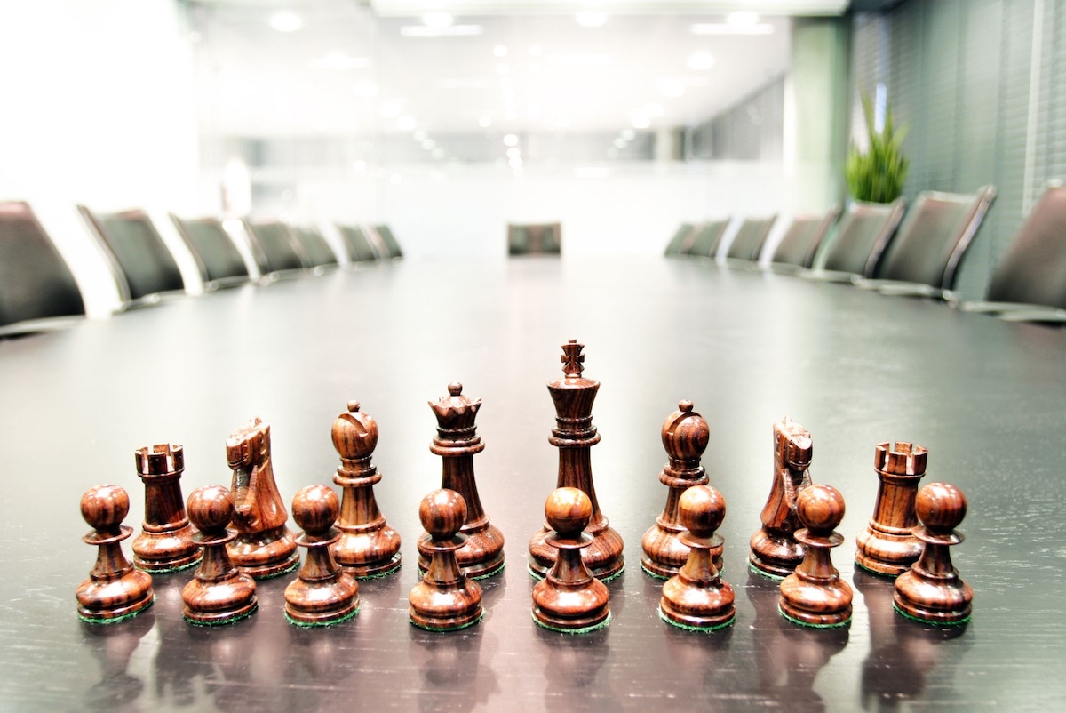 A chess set in a boardroom