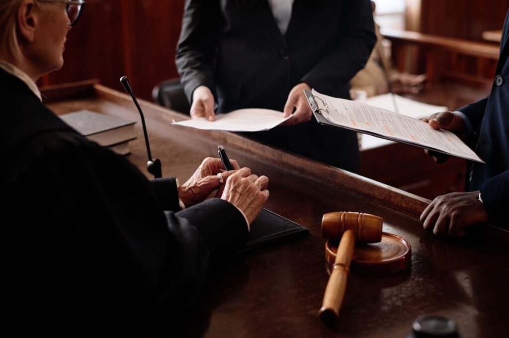 Litigators talking to a judge
