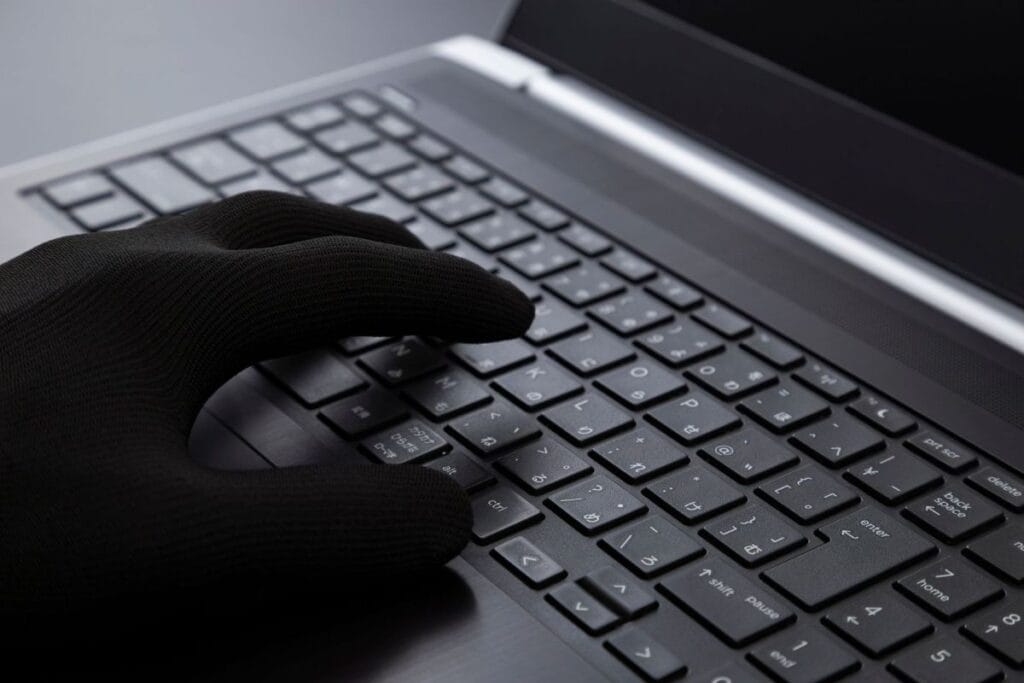Gloved hand typing